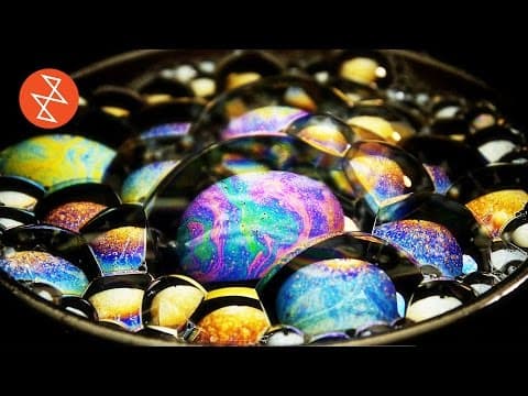 Macro Video of Iridescent Soap Bubbles by Stereokroma