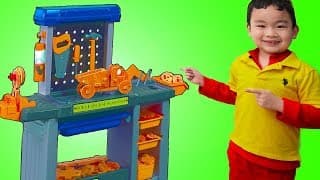 Lyndon Pretend Play as Mechanic with Spiderman Toy Car