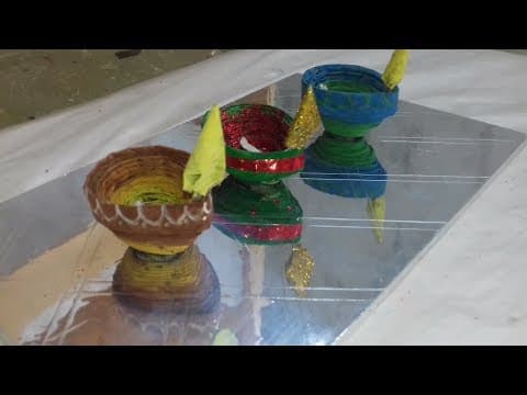 how to make news paper diya ; how to make paper diya with paper