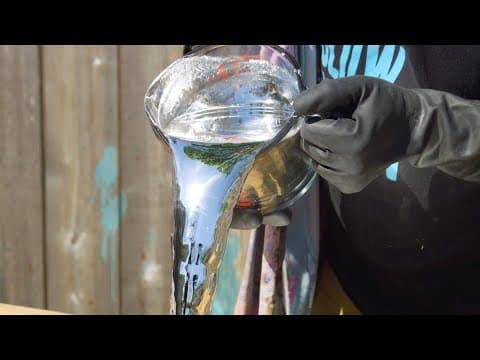 Pouring a Liquid Mirror in Slow Motion