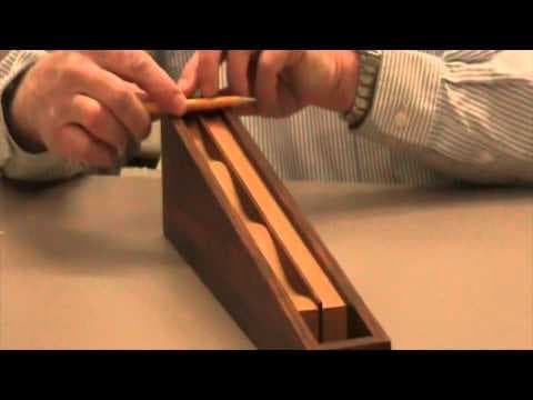 Which ball will race to the bottom first.