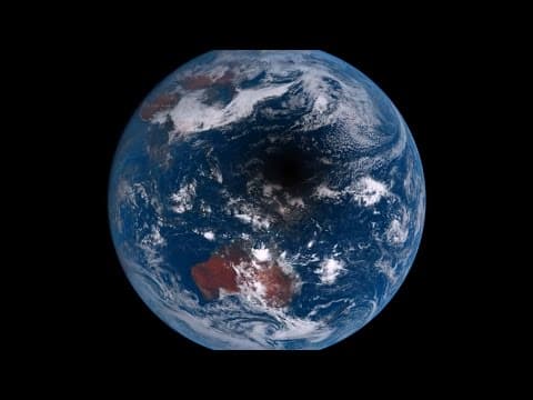 Watch as the moon casts a 3,000 - mile - wide shadow on earth