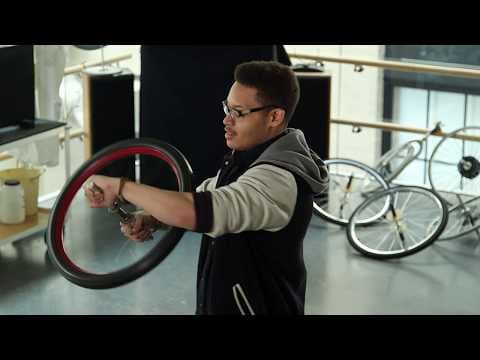 Spinning Bike Wheel and Conservation of Angular Momentum