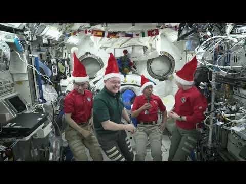 Happy Holidays from the International Space Station - 'With our space family'