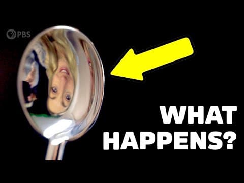 How does your reflection flip when you bend a spoon inward