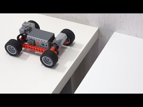 Making a LEGO car cross longer and longer gaps