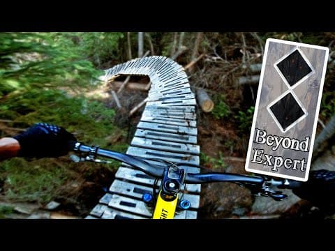 Riding a Beyond Expert mountain bike trail in British Columbia