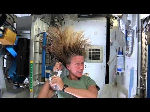 How do you wash long hair in space?