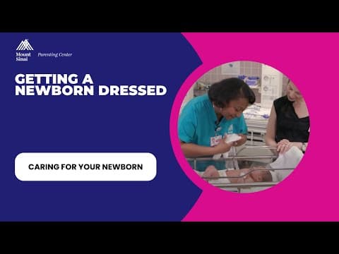 Getting a newborn dressed