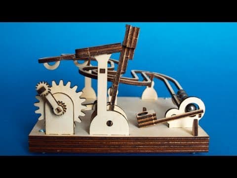 Laser-cut, flat-packed, wood DIY modular marble machine kits